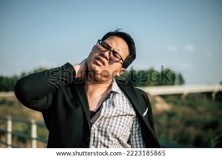 Similar – Portrait of a young man in the bamboo jungle