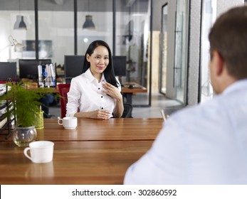 Young Asian Businesswoman Looking Confident Making A Self Introduction During A Job Interview.