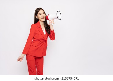 Young Asian businesswoman in red suit holding megaphone isolated on white background, Speech and announce concept - Powered by Shutterstock