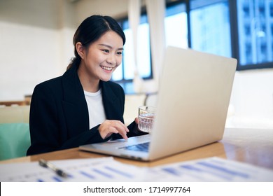 Young Asian businesswoman using laptop was working at home.
