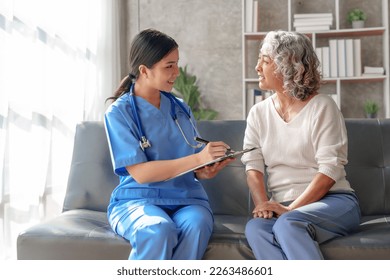 Young asian caretaker with 60s asia elderly woman consulting and encourage, take a history and recommend the right treatment to live happily in retirement, Taking a patient's history - Powered by Shutterstock