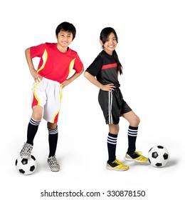 Young Asian Children Playing Soccer, Isolated Over White