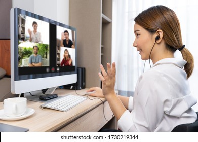 Young Asian Chinese Ethnicity Using Laptop For Meeting Online, Social Distancing, Quarantine, Online Conference