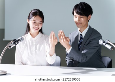 Young Asian Couple In Engagement Announcement