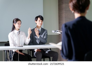 Young Asian Couple In Engagement Announcement