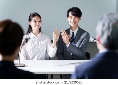 Young Asian Couple In Engagement Announcement