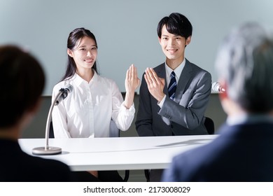 Young Asian Couple In Engagement Announcement