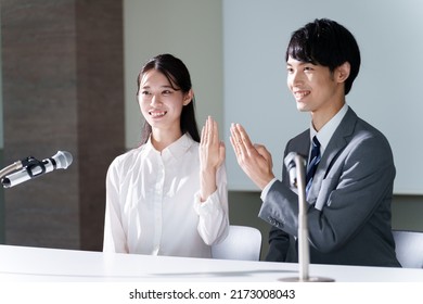 Young Asian Couple In Engagement Announcement