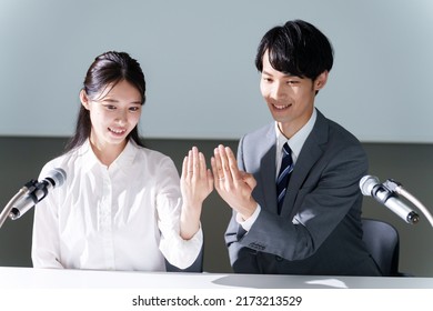 Young Asian Couple In Engagement Announcement