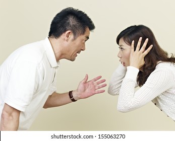 Young Asian Couple Having An Argument.