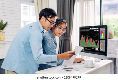 Young asian couple relaxing using laptop computer work and video conference meeting online chat.Creative business couple planning strategy analysis and brainstorm at home - Shutterstock ID 2209499179
