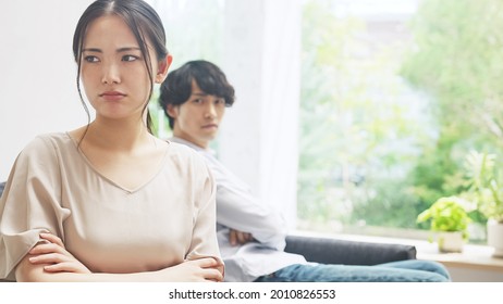 Young Asian couple with a terrible atmosphere.