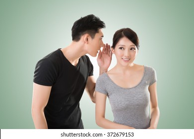 Young Asian Couple Whisper, Closeup Portrait.