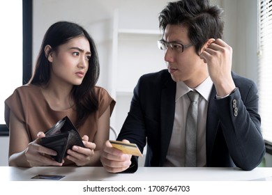 Young Asian Couples Are Stressed Trying To Make Money To Pay Off Credit Card Debt, Financial Problem Concept.