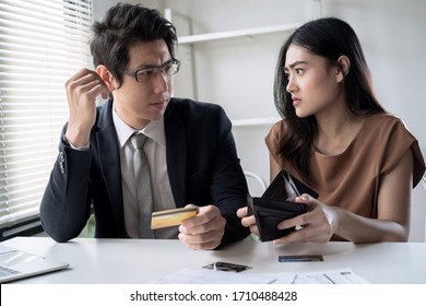 Young Asian Couples Are Stressed Trying To Make Money To Pay Off Credit Card Debt, Financial Problem Concept.