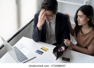 Young Asian Couples Are Stressed Trying To Make Money To Pay Off Credit Card Debt, Financial Problem Concept.