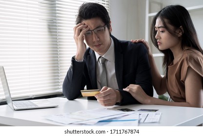 Young Asian Couples Are Stressed Trying To Make Money To Pay Off Credit Card Debt, Financial Problem Concept.