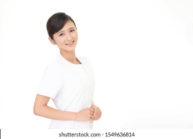 Young Asian Esthetician On White Background
