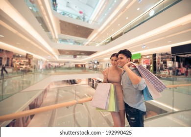 Young Asian Family In The Mall