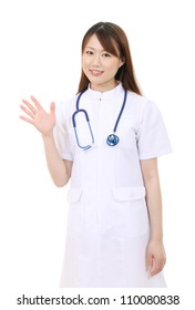 Young Asian Female Nurse Waving Hand