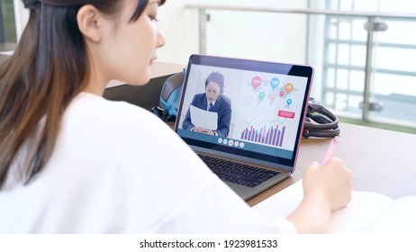 Young Asian Female Student Taking Online Lessons.