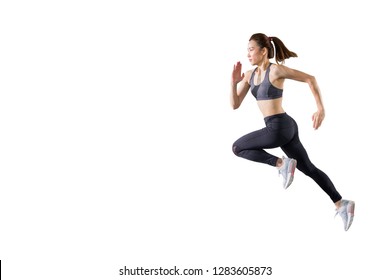 young asian fitness woman in sportwear  running  isolated on white background . excited runner , jumping  girl with copy space