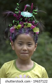 Young Asian Girl With A Crazy Hair Style