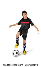 Young Asian Girl Playing Soccer, Isolated Over White