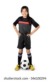 Young Asian Girl Playing Soccer, Isolated Over White