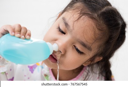Young Asian Girl Sick Kids Cleaning Nose With Nasal Irrigation