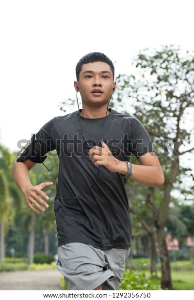 Young Asian Guy Running Fast Park Stock Photo 1292356750 | Shutterstock