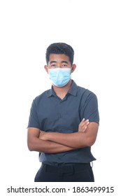 Young Asian Guy Wears Face Mask Isolated On White Background