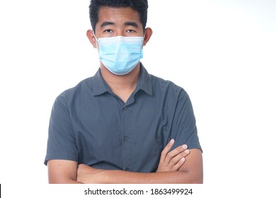 Young Asian Guy Wears Face Mask Isolated On White Background