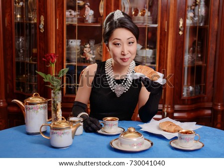 Young Asian lady in the image from classic film