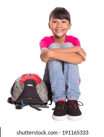 A Young Asian Malay Girl With A Backpack Over White Background