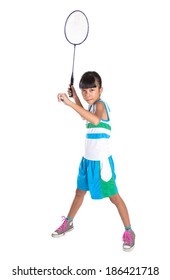 Young Asian Malay girl with a badminton racket over white background