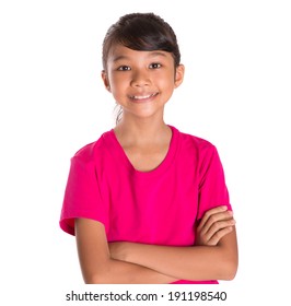 Young Asian Malay girl in pink tshirt over white background