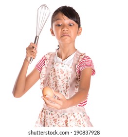 Young Asian Malay Girl Wearing Apron With Egg Beater And Chicken Agg