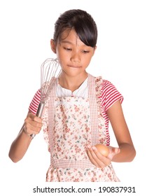 Young Asian Malay Girl Wearing Apron With Egg Beater And Chicken Egg 