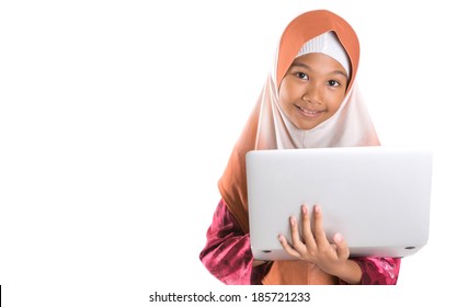 Young Asian Malay Muslim Girl In Modern Hijab With A Laptop Over White Background