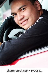 Young Asian Male In The Car