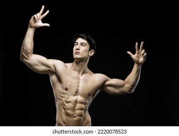 Young Asian Male Fitness Model Poses On Studio Over Dark Background On 18 November 2015. Photo By Victor Fraile