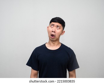 Young Asian Man Feels Confused Looking Up Isolated