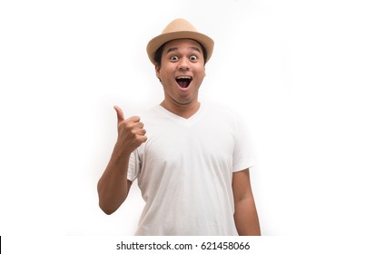 Young Asian Man With Hat Feels Shock And Surprise With Overly Face Expression.