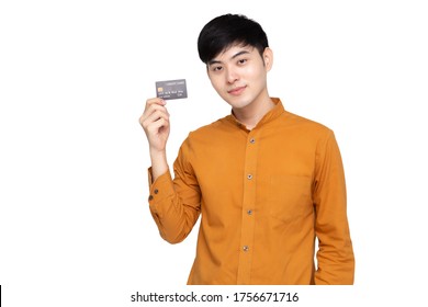 Young Asian Man Holding Credit Card Isolated On White Background