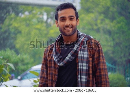 Young Asian man image Near road