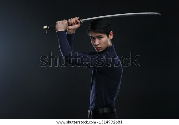 Young Asian Man Katana His Hands Stock Photo (Edit Now) 1314992681