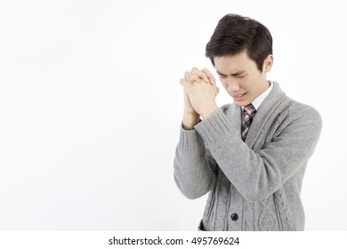 Young Asian Man Praying