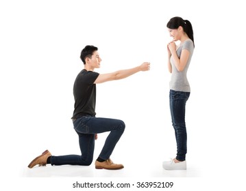 Young Asian Man Propose To His Girlfriend, Studio Shot