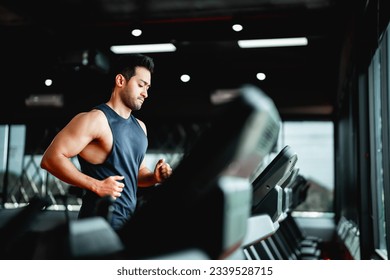 Young Asian Man Running on Treadmill - Fitness Gym Exercise - Powered by Shutterstock